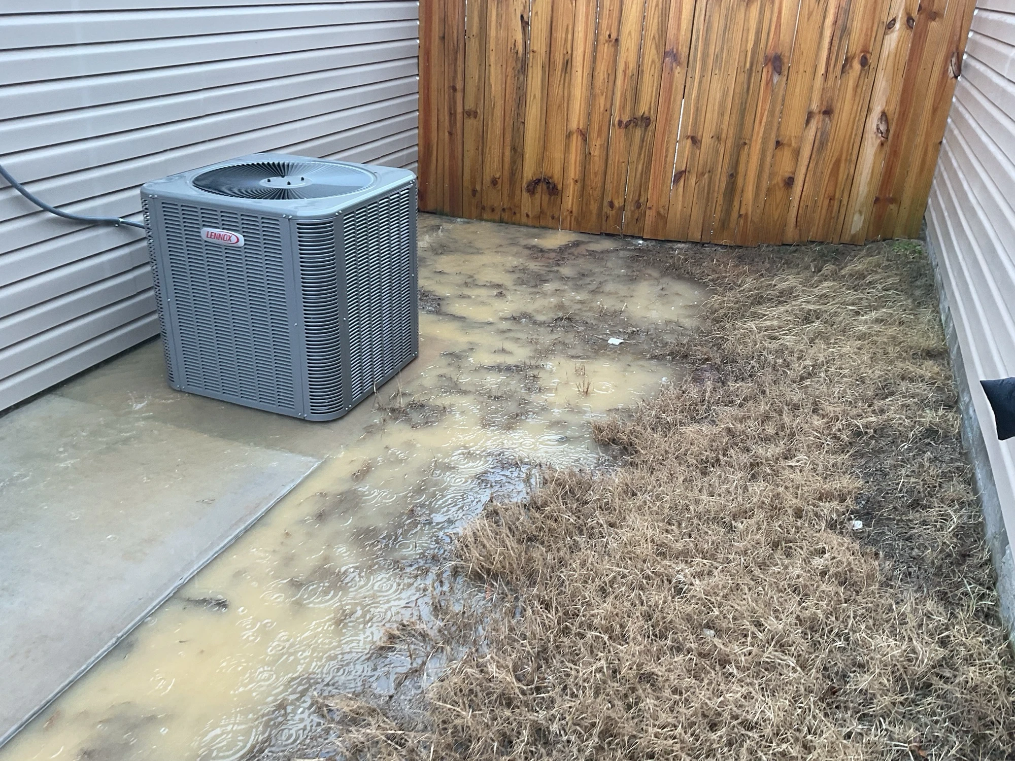 Water pooling around house